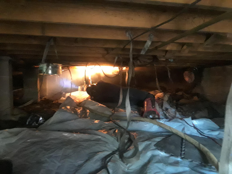 Smoke and soot removal from crawl space after fire.   Georgia